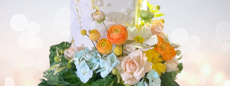 Custom wedding cake with sugar flowers by Blissful Bites